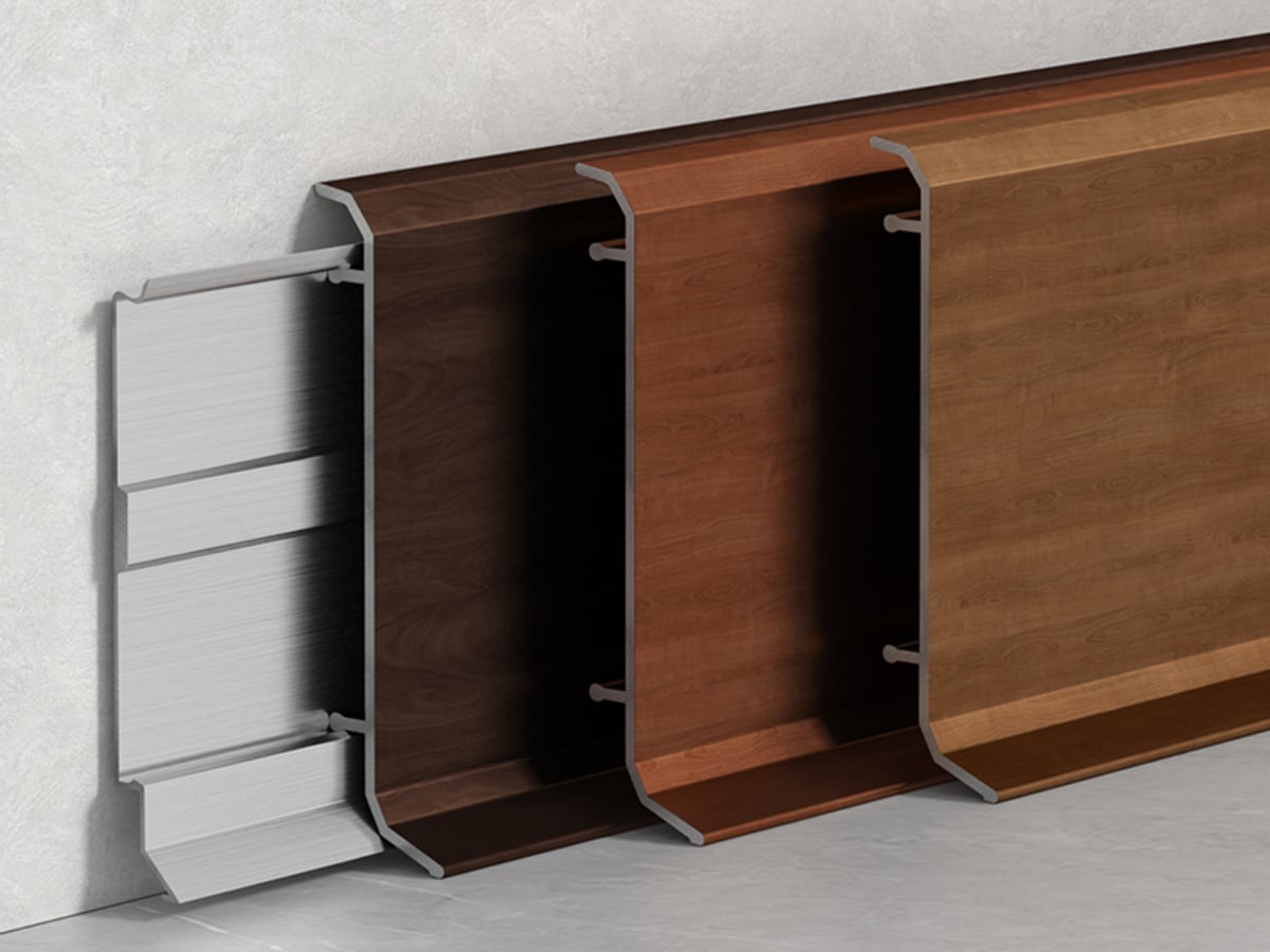 Woodgrain aluminium skirting with an upturned top edge